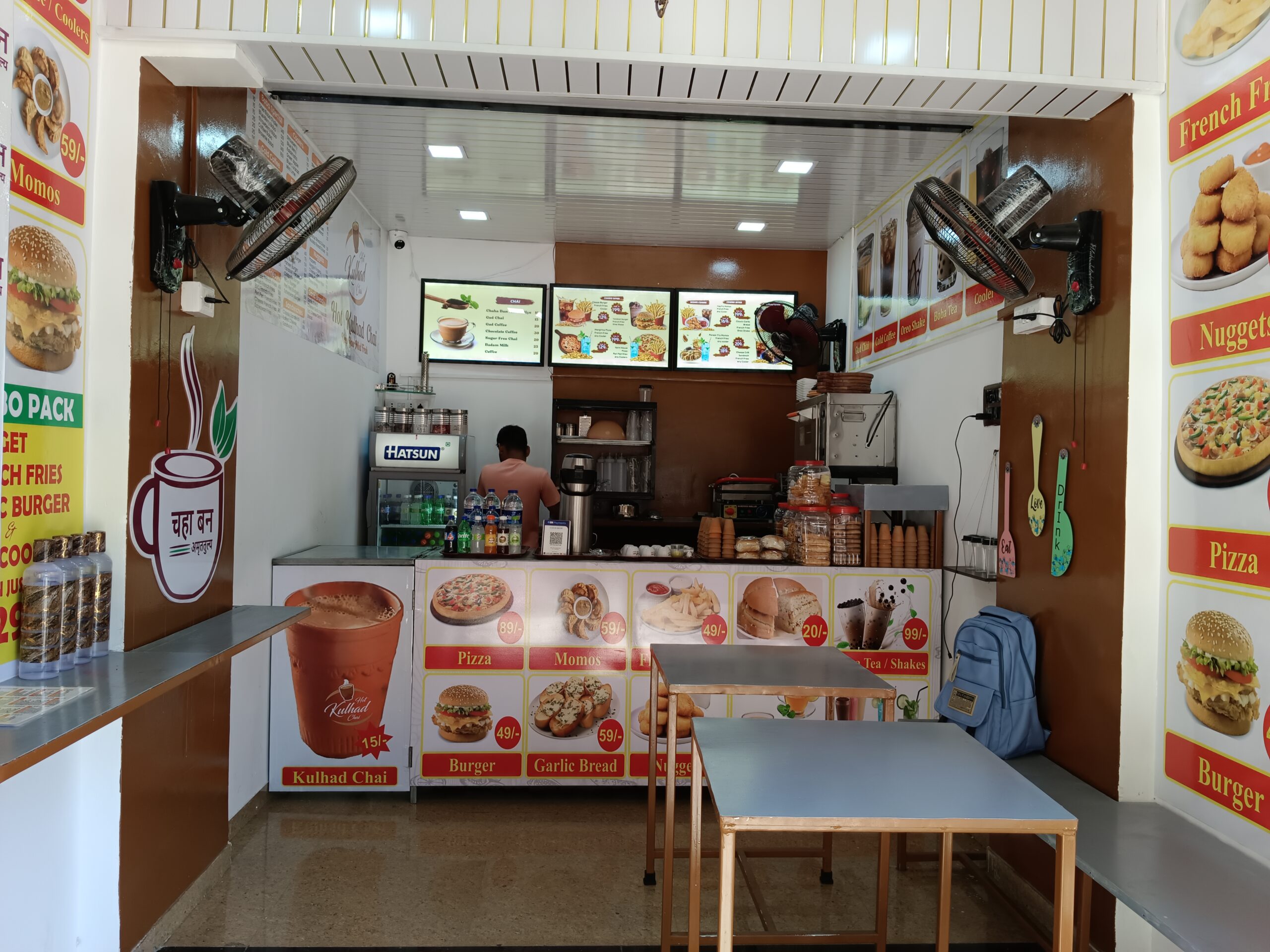 Cozy Chaha Bun café interior with tea and buns on a wooden table