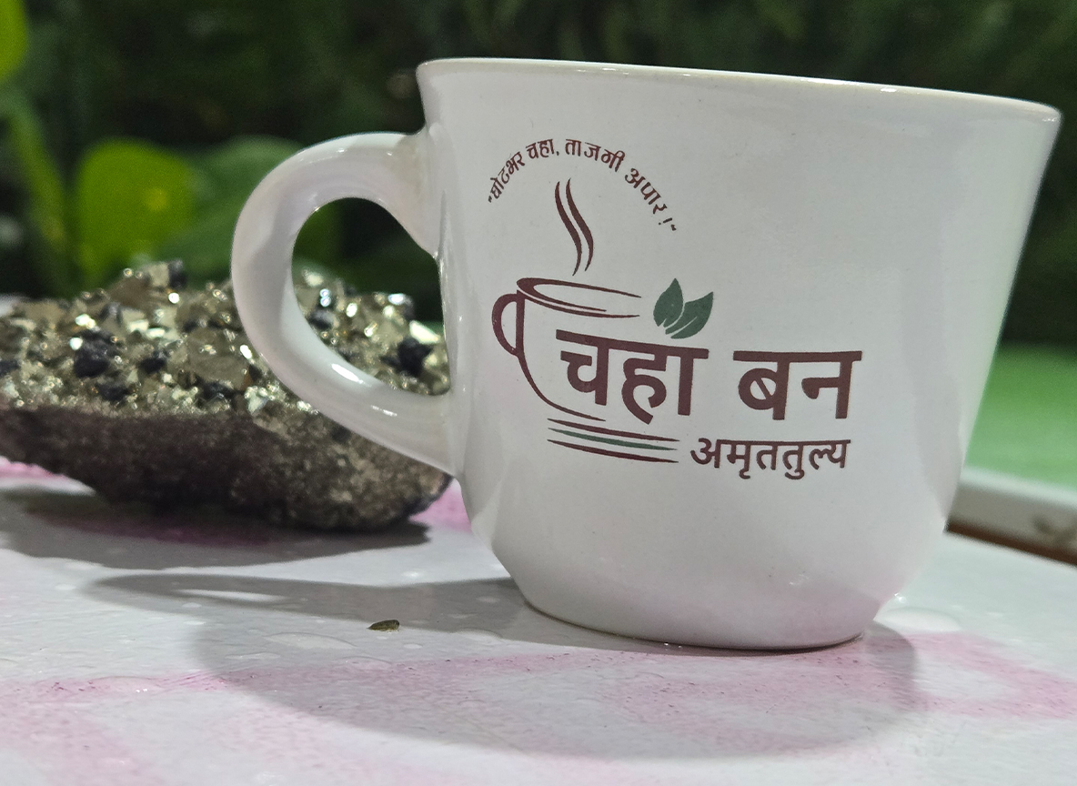 Freshly brewed Indian tea and soft buns served in a cozy cafe